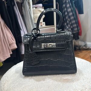 Black croc top handle bag